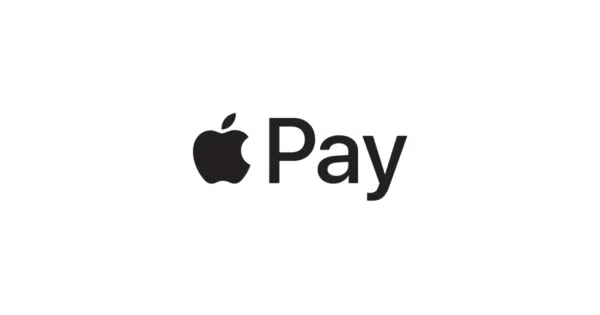 Persona realizando un pago con Apple Pay utilizando un iPhone en una terminal sin contacto.