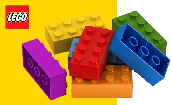Vista en corte de una pieza LEGO mostrando los tubos internos y el sistema de anclaje que permite unir los bloques con precisión.